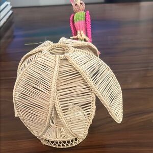 Woven Rattan Candle Holder with Pink Bird Accent
